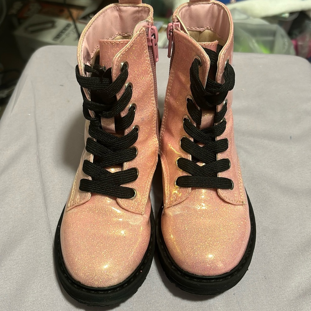 Super cute BRAND NEW, NEVER WORN zipper boots. PINK IN COLOR.